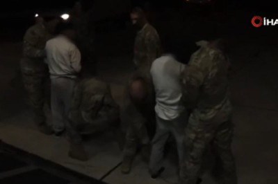 ABD'ye kaçak giren suçlu göçmenlerin Guantanamo'ya götürüldüğü anlar